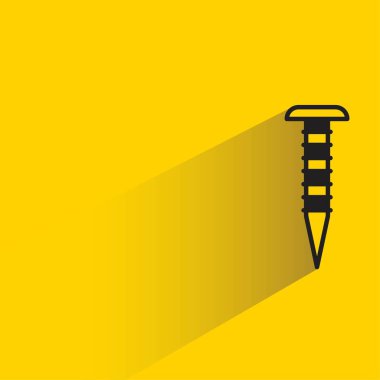 tack and nail with shadow on yellow background clipart