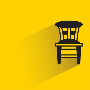Sarı arkaplanda gölgesi olan sandalye simgesi