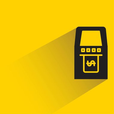 sarı arkaplanda gölgesi olan atm simgesi