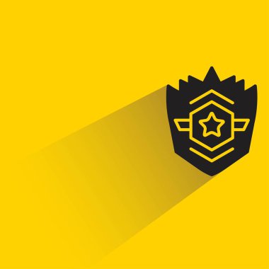 Sarı arkaplanda gölge bırakan şövalye kalkanı simgesi