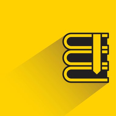 Sarı arkaplanda gölgesi olan kitap simgesi