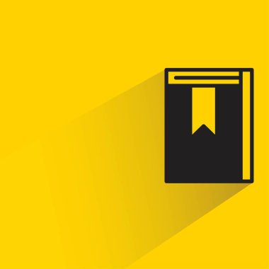 Sarı arkaplanda gölgesi olan kitap simgesi