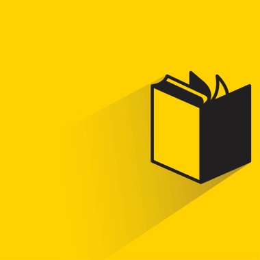 Sarı arkaplanda gölgesi olan kitap simgesi