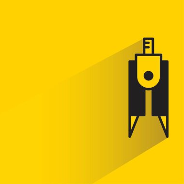 Sarı arkaplanda damla gölgesi olan pusula bölücüsü