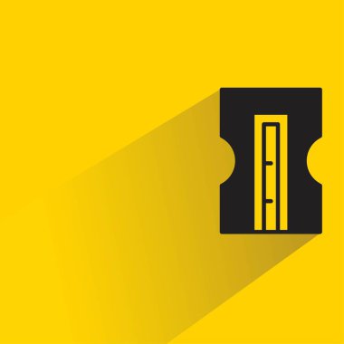 Sarı arkaplanda gölgesi olan kalem açacağı simgesi