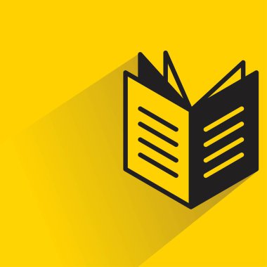 Sarı arkaplanda gölgesi olan kitap simgesi