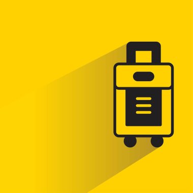 sarı arkaplanda gölgesi olan bagaj simgesi
