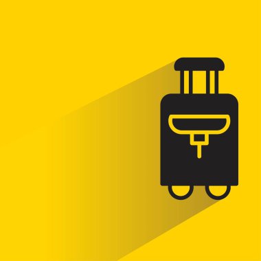 sarı arkaplanda gölgesi olan bagaj simgesi