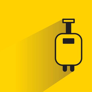 sarı arkaplanda gölgesi olan bagaj simgesi