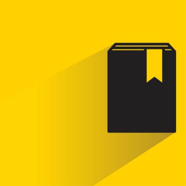 Sarı arkaplanda gölgesi olan kitap simgesi