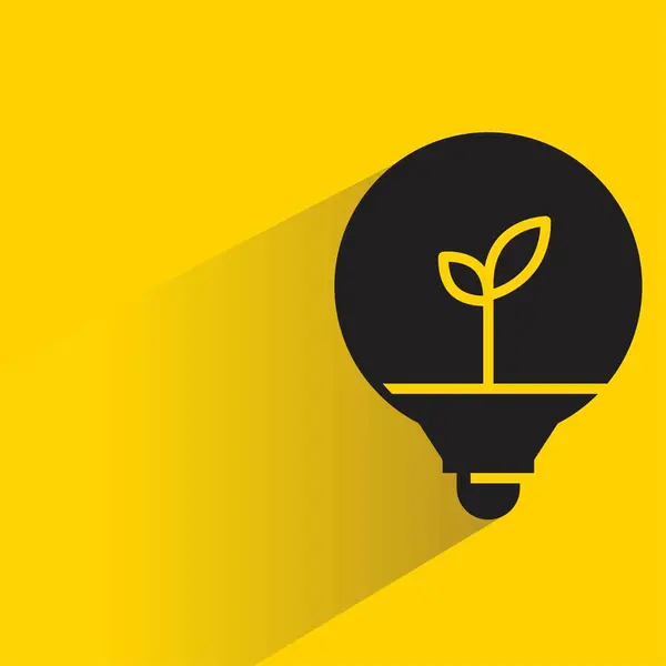 Stock vector plant in light bulb with drop shadow on yellow background