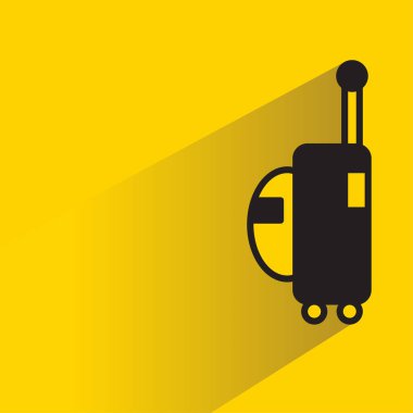 sarı arkaplanda gölgesi olan bagaj simgesi
