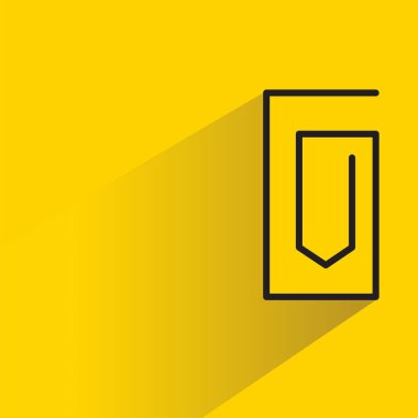 Sarı arkaplanda gölgesi olan ataç simgesi