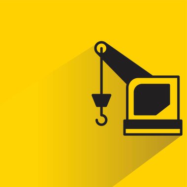 Sarı arkaplanda gölgesi olan port vinç simgesi