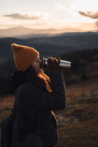 Young Woman Orange Beanie Hat Drinking Tea Thermos Outdoors Front — Stock Photo, Image