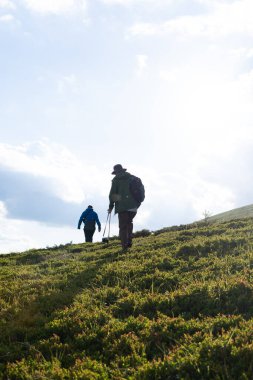 People traveling through the mountains