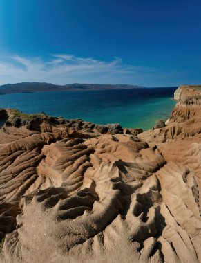 view of beautiful beach with sea waves in gokceada island