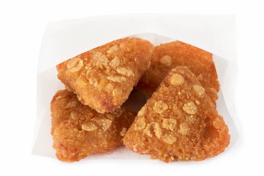 chicken nuggets on a white plate isolated on a background