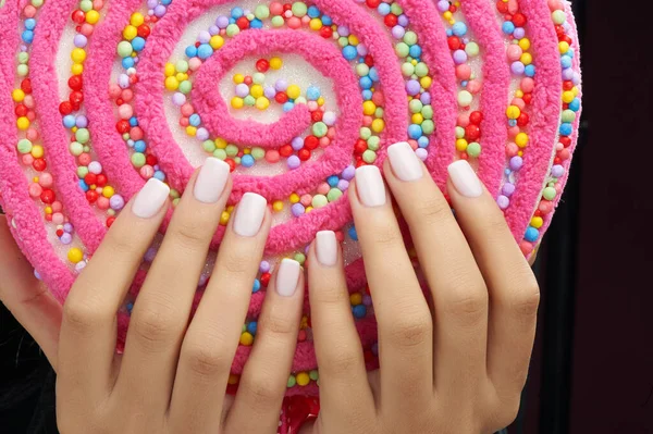 Colorful rainbow collection of nail designs for summer and winter