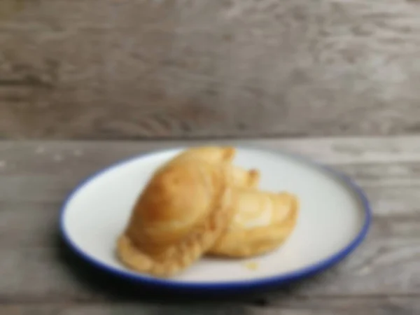 Blurred Curry Puff Wood Background — Stock Photo, Image