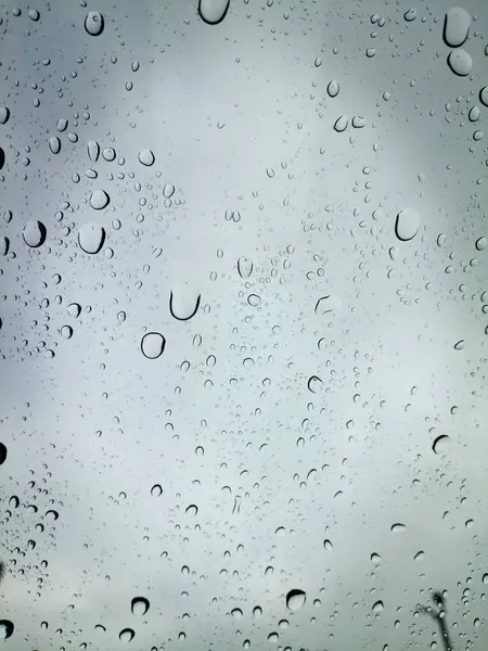 Water Druppels Regen Blauwe Achtergrond Rechtenvrije Stockfoto's