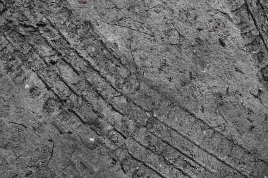 Toprak yol arkaplanı veya desen üzerindeki tekerlek izleri