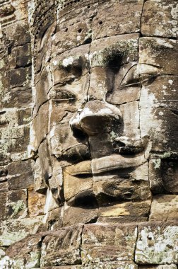 Yüzü Angkor Wat, Kamboçya 'daki antik bir Khmer tapınağına oyulmuş.