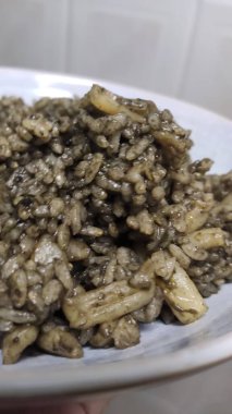 Black rice with sheafood on a plate