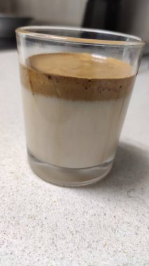 Latte macchiato with cocoa powder