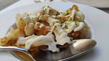 Grilled cuttlefish squid with parsley sauce and garlic