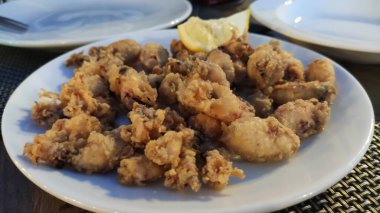 Grilled cuttlefish squid with parsley sauce and garlic