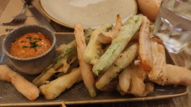 Tempura vegetables with spanish typical romescu sauce.