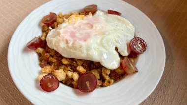 Migas with a fried egg clipart
