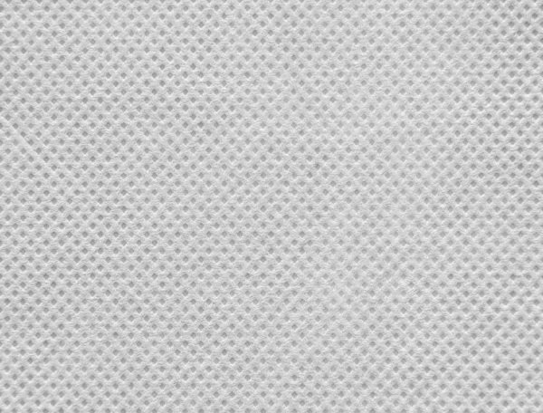 不織布又はスパンボンド生地の白色の質感の背景 — ストック写真