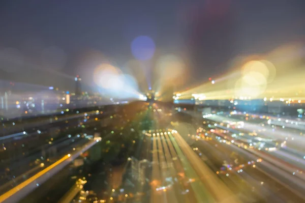 Blurred Abstract Background Skyscrapers Night Bokeh Lights Trail Using Zoom — Stock Photo, Image