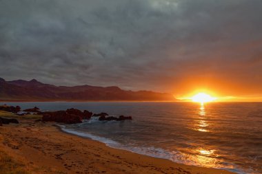 Sunrise at Budor beach, Iceland clipart