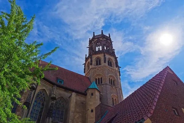 Stock image Tower of St Ludgeri catholic church against blue sky on sunny day. Muenster, Germany