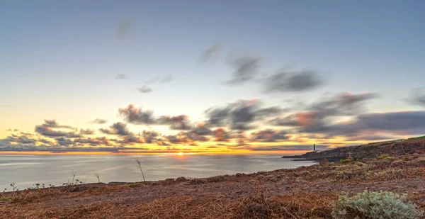 Long Exposure Sunrise Rough Coastline Lighthouse Dusk — Stock Photo, Image