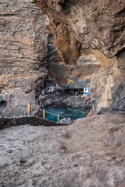 Track to hidden fishing village under the cliffs
