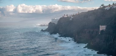 Panoramic View of Tenerifes Touristic buildings Landscape with high cliffs and rises