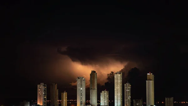 Red Electric Storm Illuminates Dark Night Sky Cityscape Dominated Tall — Stock Photo, Image