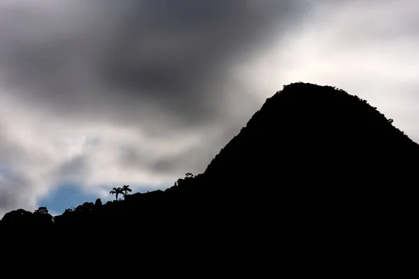 Stunning Granite Mountain Peak Stands Silhouette Dark Impenetrable Jungle Sky — Stock Photo, Image