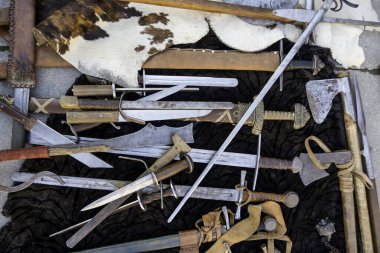 Detail of ancient medieval weapons, war and crime