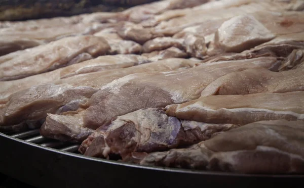 Raw pork meat in a market, tenderloins