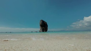 Beautiful crystal clear blue ocean at island in Krabi, Thailand. View from the shore. High quality 4k footage