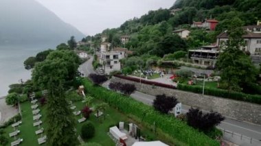 View From Above Of Lake Como And Italian Village In Bellagio, Italy. aerial view. High quality FullHD footage