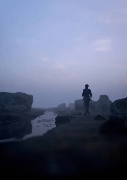 男は日の出に霧の岩の川に沿って歩く 3Dレンダリング — ストック写真