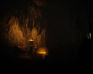 Kafatasları ve kemikleri eski ve gizemli bir mağarada. 3 Boyutlu Hazırlama.