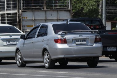 Chiangmai, Thailand -   June  1 2023: Private Sedan car Toyota Vios. On road no.1001 8 km from Chiangmai Business Area.