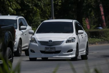Chiangmai, Thailand -   June  1 2023: Private Sedan car Toyota Vios. On road no.1001 8 km from Chiangmai Business Area.